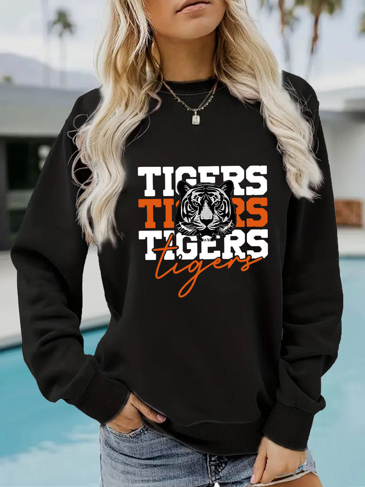 Kvinnas sweatshirt med djurisk tigerdesign och avslappnad passform Mirla-Eva Jonsson