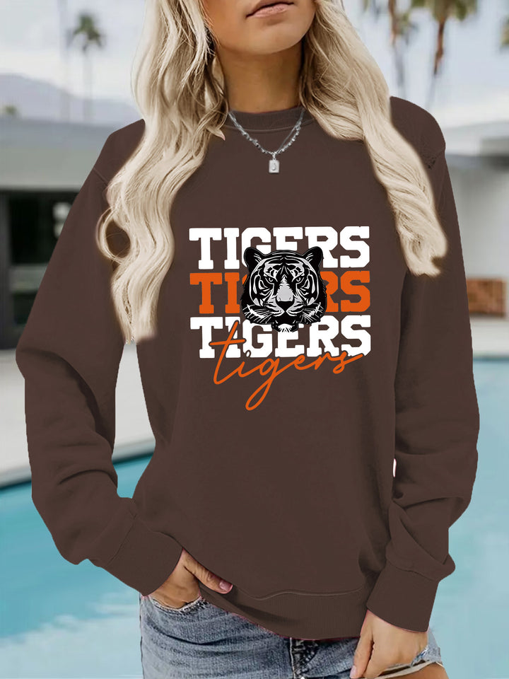 Kvinnas sweatshirt med djurisk tigerdesign och avslappnad passform Mirla-Eva Jonsson