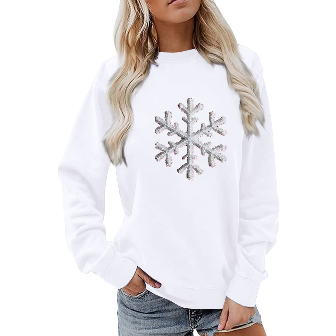 Kvinnas sweatshirt med glittrande snöflinge design och avslappnad passform Mirla-Eva Jonsson