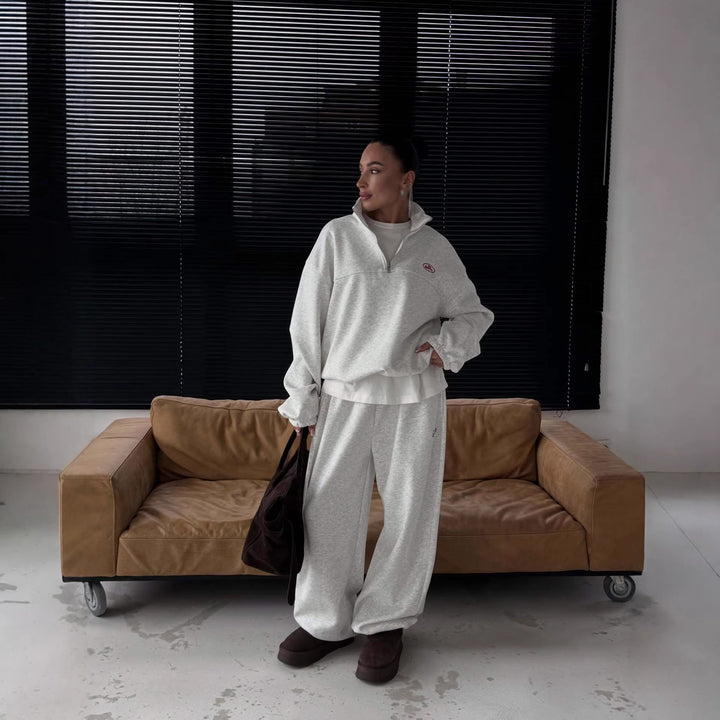 Kvinno avslappnad hoodie med halv dragkedja och vida ben Mirla-Eva Jonsson