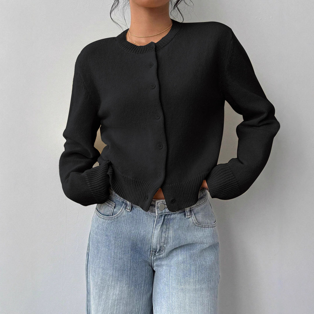Kvinno cardigan med fin ribbad textur och knäppt design Mirla-Eva Jonsson