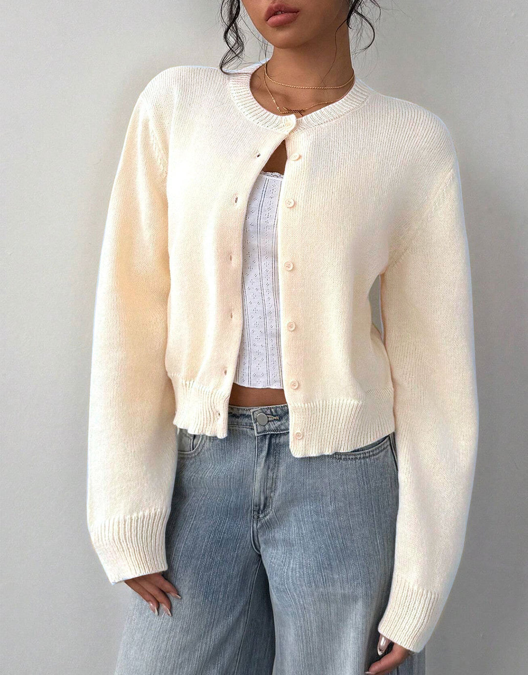 Kvinno cardigan med fin ribbad textur och knäppt design Mirla-Eva Jonsson