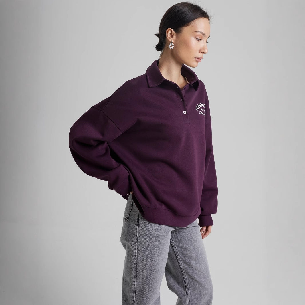 Kvinno casual polo tröja med en avslappnad passform och kontrasterande detaljer Mirla-Eva Jonsson