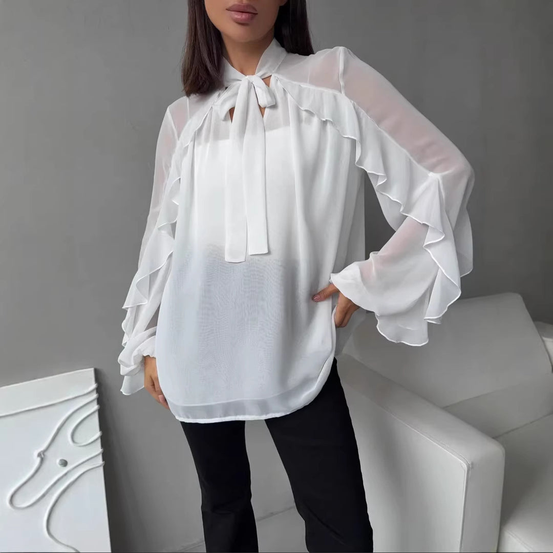 Kvinno chiffonblus med volanger och modern halsringning Mirla-Eva Jonsson