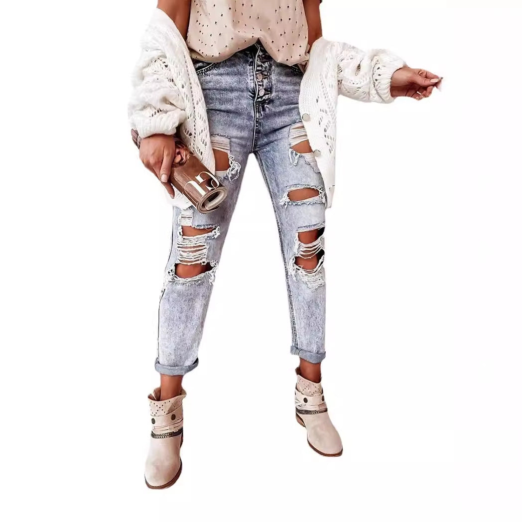Kvinno förstörda jeans i avslappnad pojkvänsmodell med hög midja och detaljer Mirla-Eva Jonsson