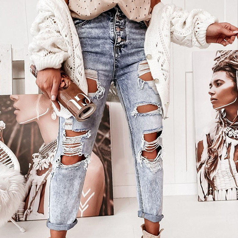 Kvinno förstörda jeans i avslappnad pojkvänsmodell med hög midja och detaljer Mirla-Eva Jonsson