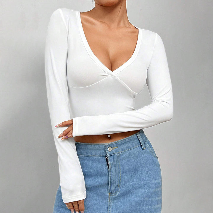 Kvinno kortärmad crop top med djup V-ringning och elegant omslagsdesign Mirla-Eva Jonsson