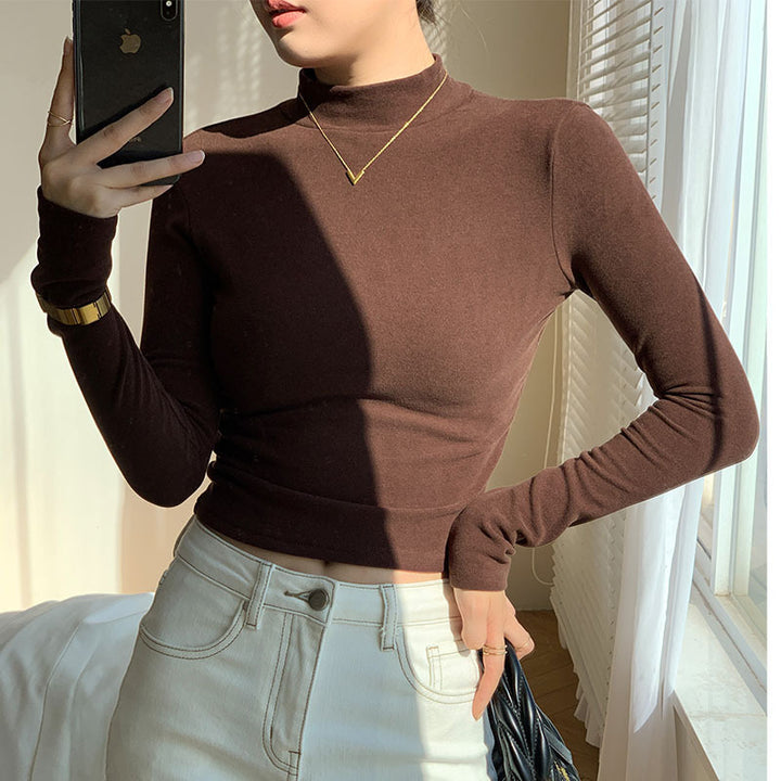 Kvinno långärmad crop top med hög krage och figursydd klipp-Eva Jonsson