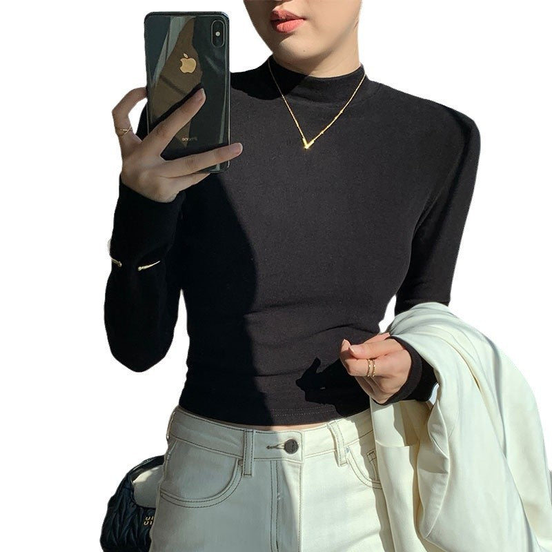 Kvinno långärmad crop top med hög krage och figursydd klipp-Eva Jonsson