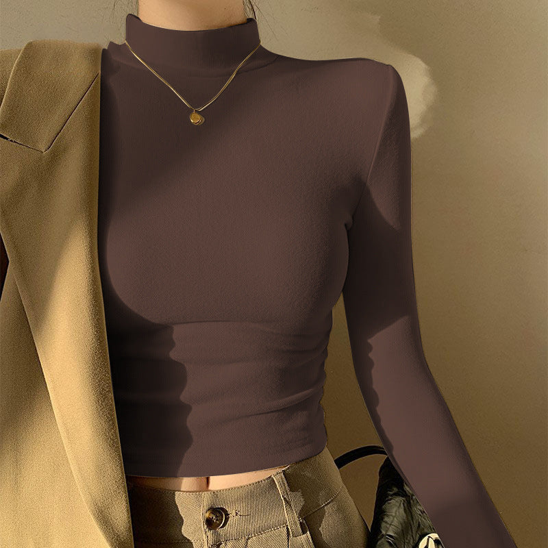Kvinno långärmad crop top med hög krage och figursydd klipp-Eva Jonsson