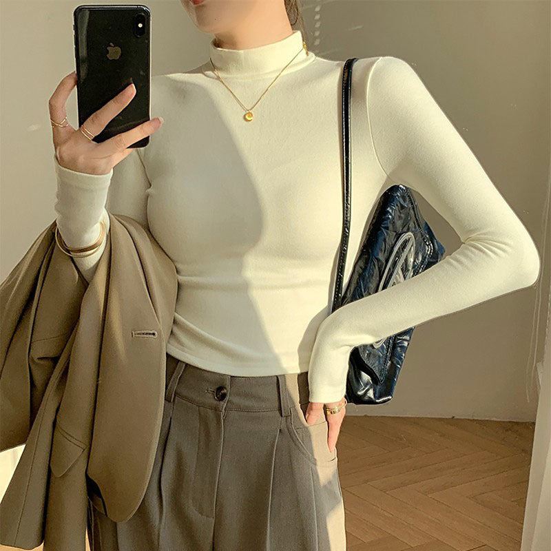 Kvinno långärmad crop top med hög krage och figursydd klipp-Eva Jonsson