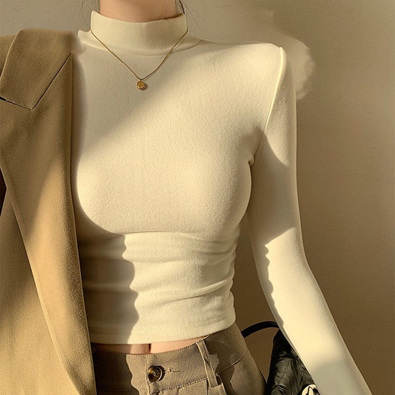 Kvinno långärmad crop top med hög krage och figursydd klipp-Eva Jonsson