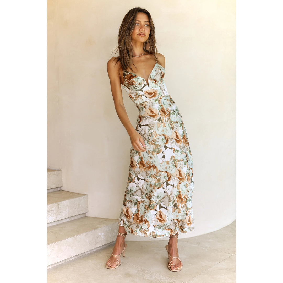Kvinno maxi klänning med elegant blommönster-Eva Jonsson