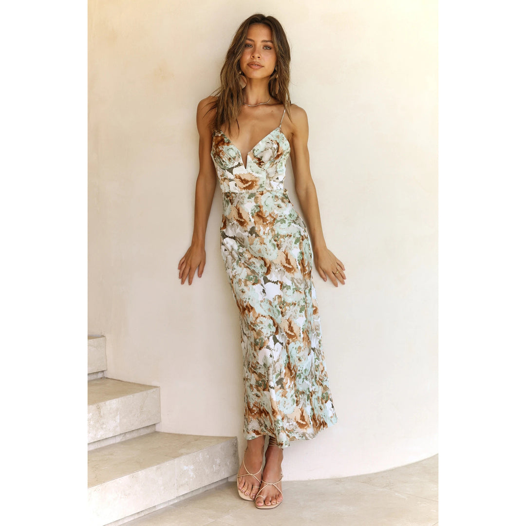 Kvinno maxi klänning med elegant blommönster-Eva Jonsson