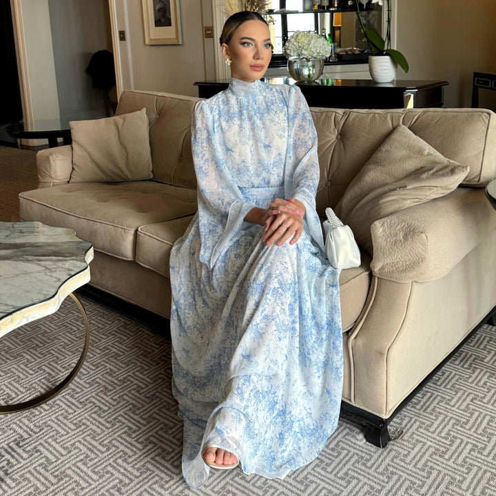 Kvinno maxi klänning med transparenta ärmar och elegant blomstermönster Mirla-Eva Jonsson