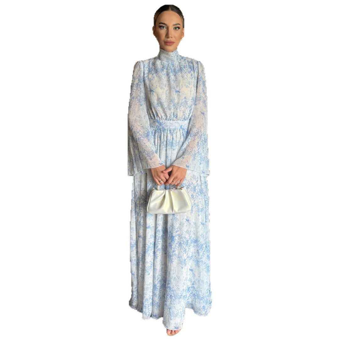 Kvinno maxi klänning med transparenta ärmar och elegant blomstermönster Mirla-Eva Jonsson