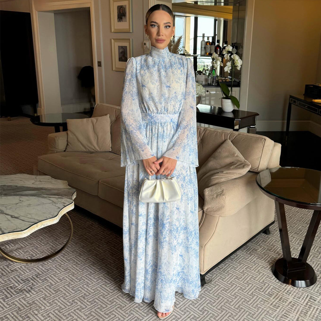 Kvinno maxi klänning med transparenta ärmar och elegant blomstermönster Mirla-Eva Jonsson