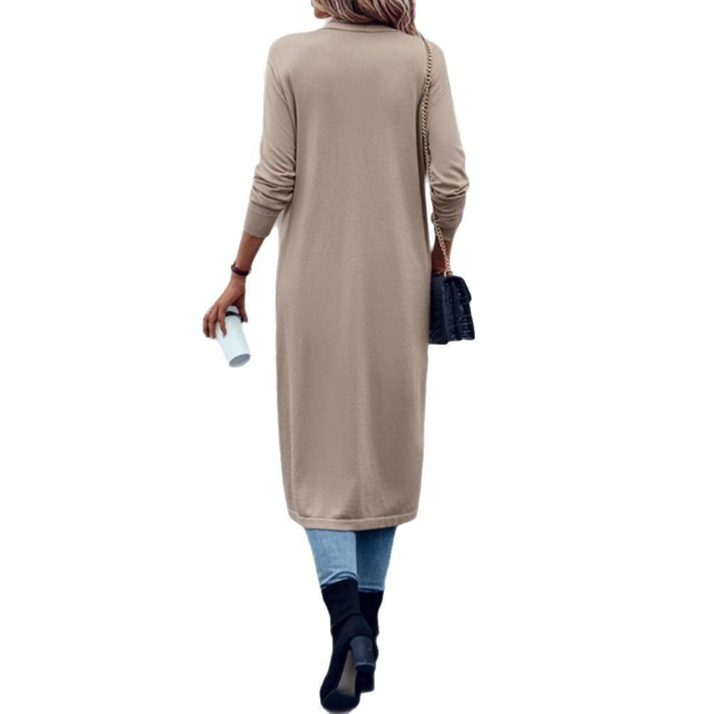 Kvinno stickad kappa med öppen design och elegant snitt-Eva Jonsson