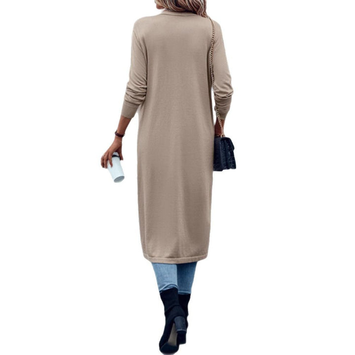 Kvinno stickad kappa med öppen design och elegant snitt-Eva Jonsson