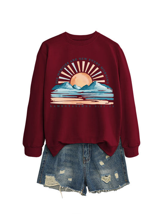 Kvinno sweatshirt med inspirerande soluppgångsdesign och avslappnad passform Mirla-Eva Jonsson
