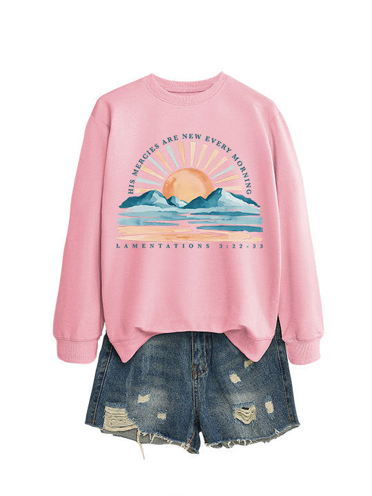 Kvinno sweatshirt med inspirerande soluppgångsdesign och avslappnad passform Mirla-Eva Jonsson