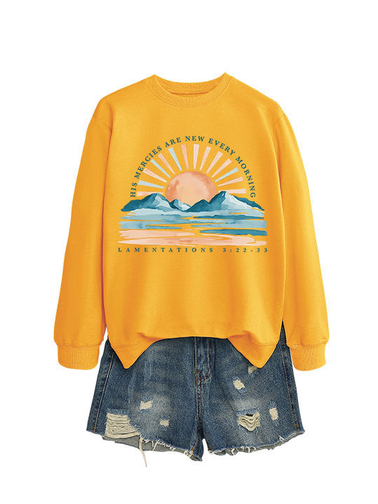 Kvinno sweatshirt med inspirerande soluppgångsdesign och avslappnad passform Mirla-Eva Jonsson