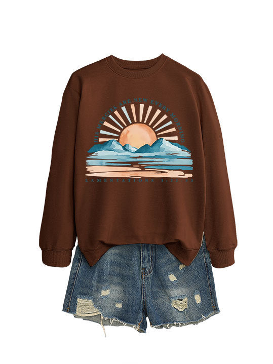Kvinno sweatshirt med inspirerande soluppgångsdesign och avslappnad passform Mirla-Eva Jonsson