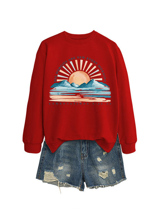 Kvinno sweatshirt med inspirerande soluppgångsdesign och avslappnad passform Mirla-Eva Jonsson