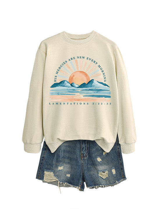 Kvinno sweatshirt med inspirerande soluppgångsdesign och avslappnad passform Mirla-Eva Jonsson