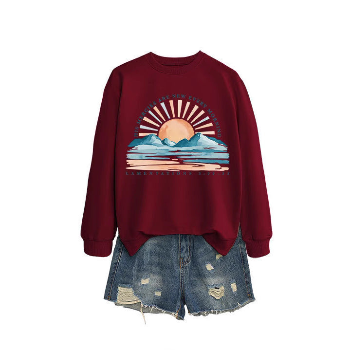 Kvinno sweatshirt med inspirerande soluppgångsdesign och avslappnad passform Mirla-Eva Jonsson