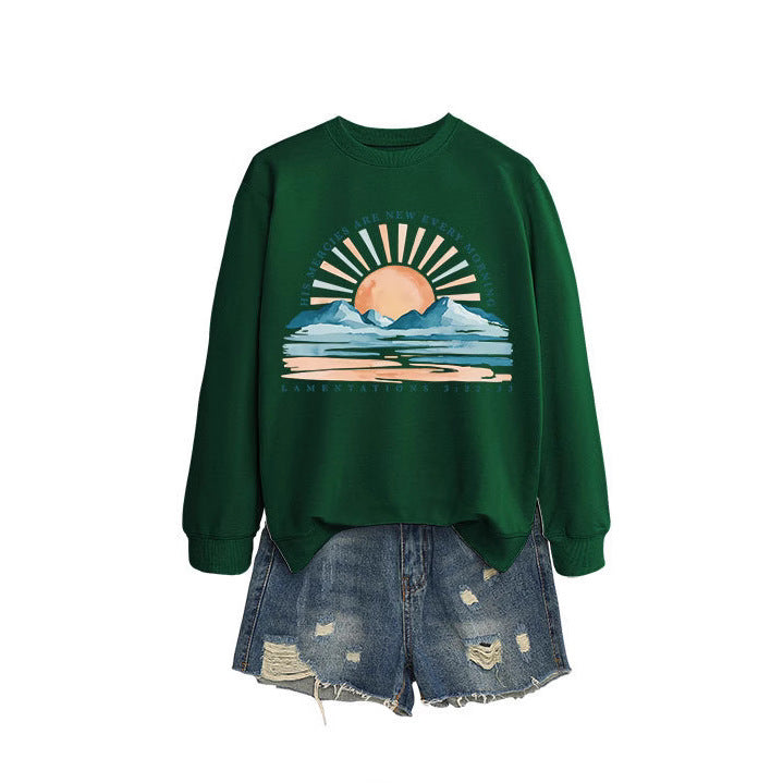 Kvinno sweatshirt med inspirerande soluppgångsdesign och avslappnad passform Mirla-Eva Jonsson