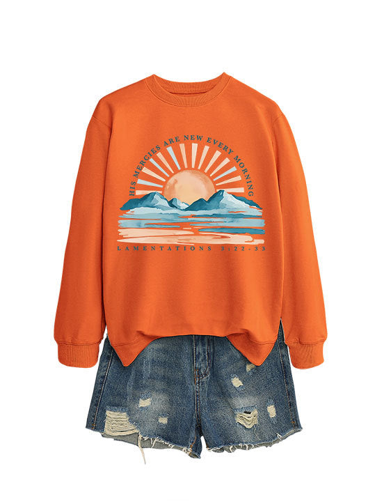 Kvinno sweatshirt med inspirerande soluppgångsdesign och avslappnad passform Mirla-Eva Jonsson