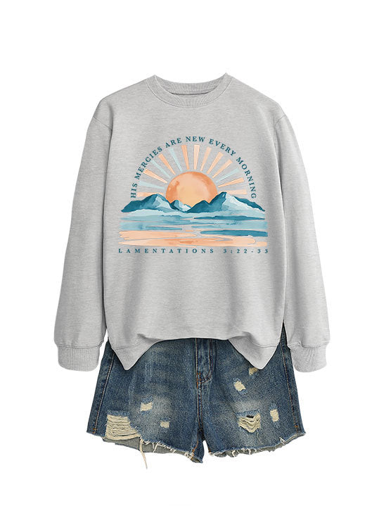 Kvinno sweatshirt med inspirerande soluppgångsdesign och avslappnad passform Mirla-Eva Jonsson