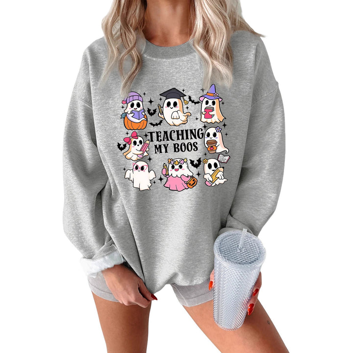 Kvinno sweatshirt med lekfull Halloween-design och avslappnad passform Mirla-Eva Jonsson