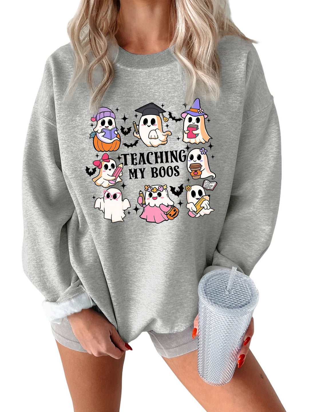 Kvinno sweatshirt med lekfull Halloween-design och avslappnad passform Mirla-Eva Jonsson