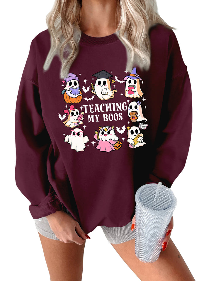 Kvinno sweatshirt med lekfull Halloween-design och avslappnad passform Mirla-Eva Jonsson