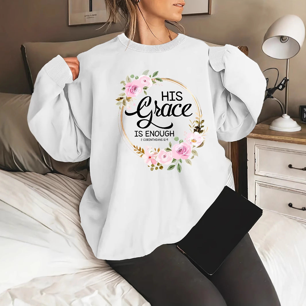 Kvinno sweatshirt med motiverande text och blommönster Mirla-Eva Jonsson