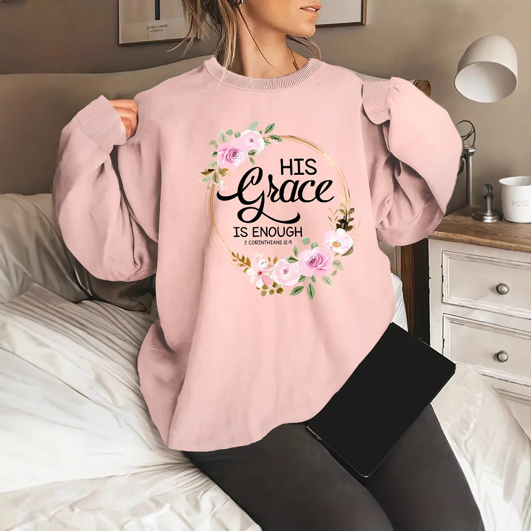 Kvinno sweatshirt med motiverande text och blommönster Mirla-Eva Jonsson