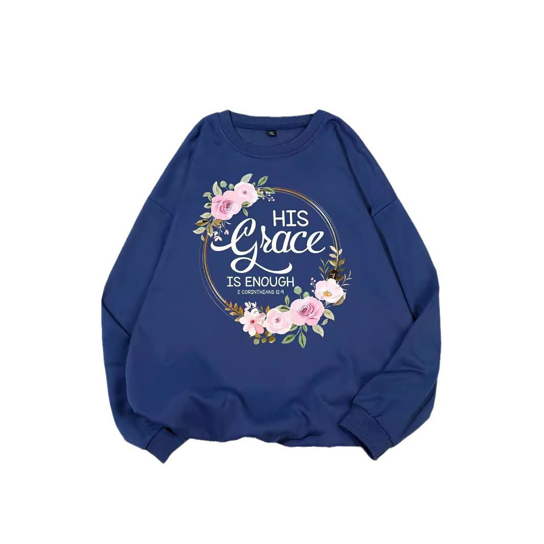 Kvinno sweatshirt med motiverande text och blommönster Mirla-Eva Jonsson