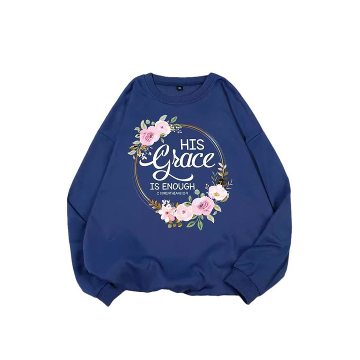 Kvinno sweatshirt med motiverande text och blommönster Mirla-Eva Jonsson