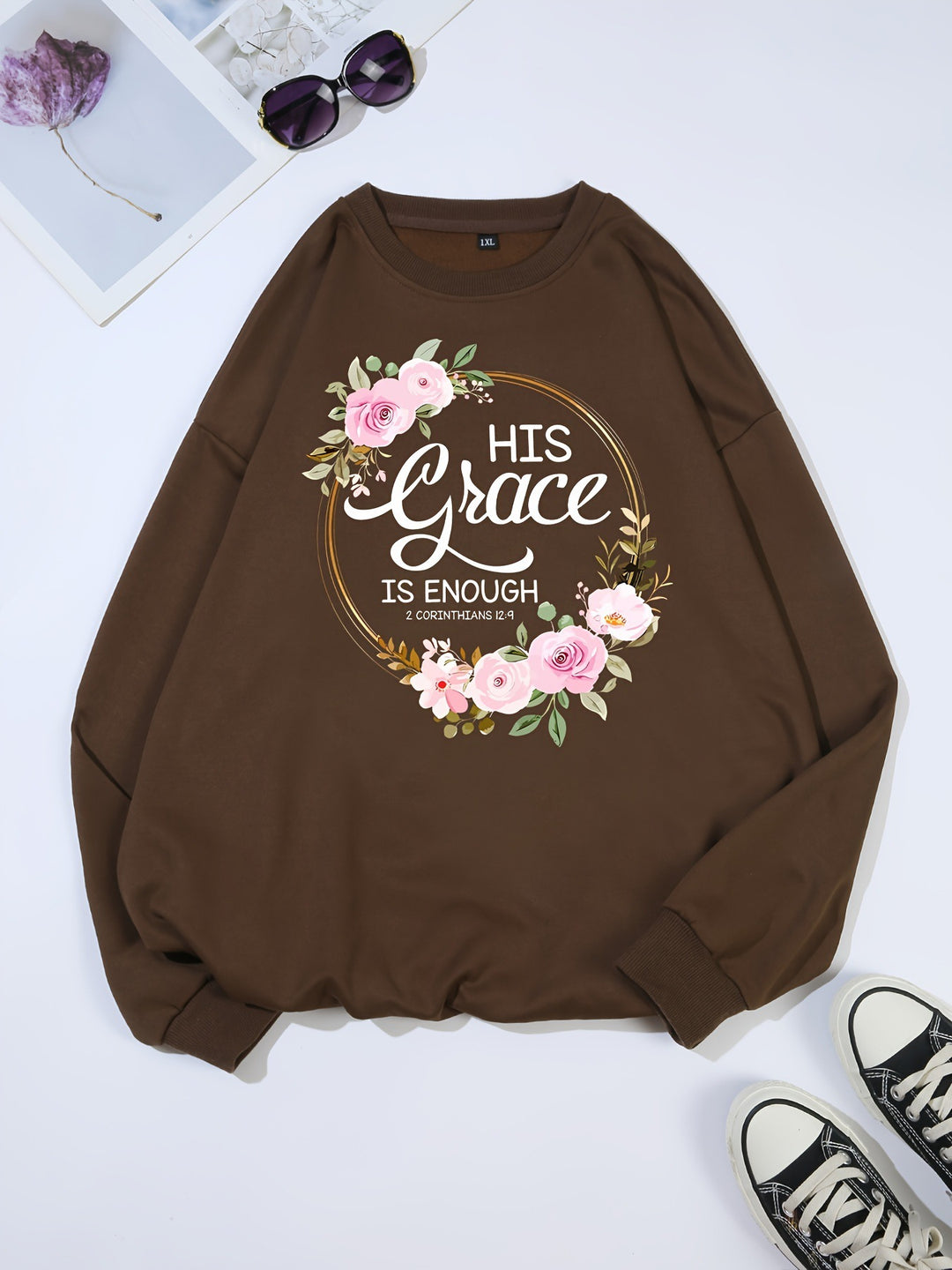 Kvinno sweatshirt med motiverande text och blommönster Mirla-Eva Jonsson