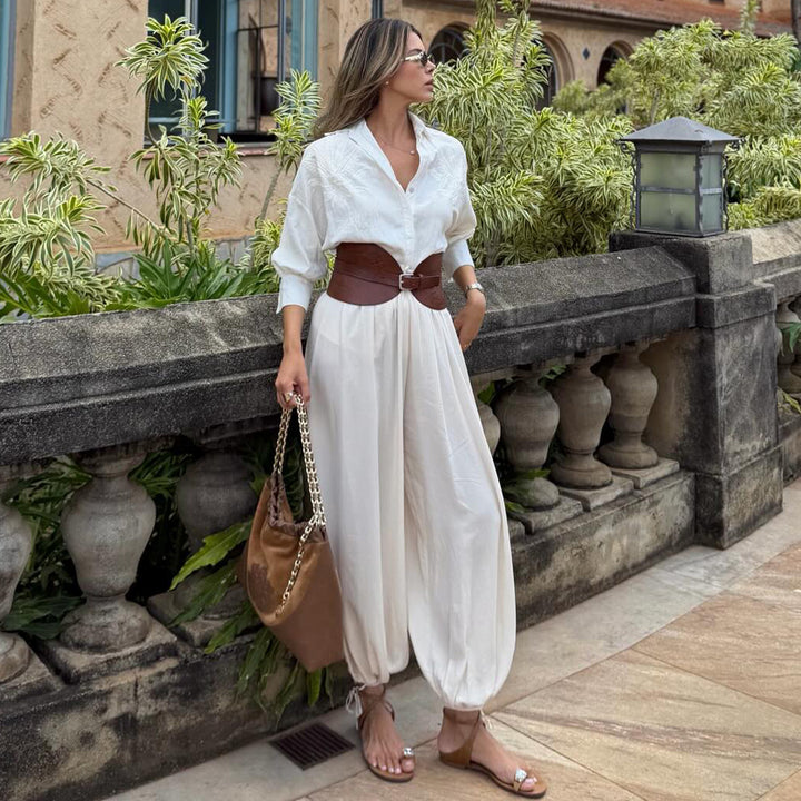 Kvinno voluminös byxdress med elegant knappblus och midjebälte Mirla-Eva Jonsson