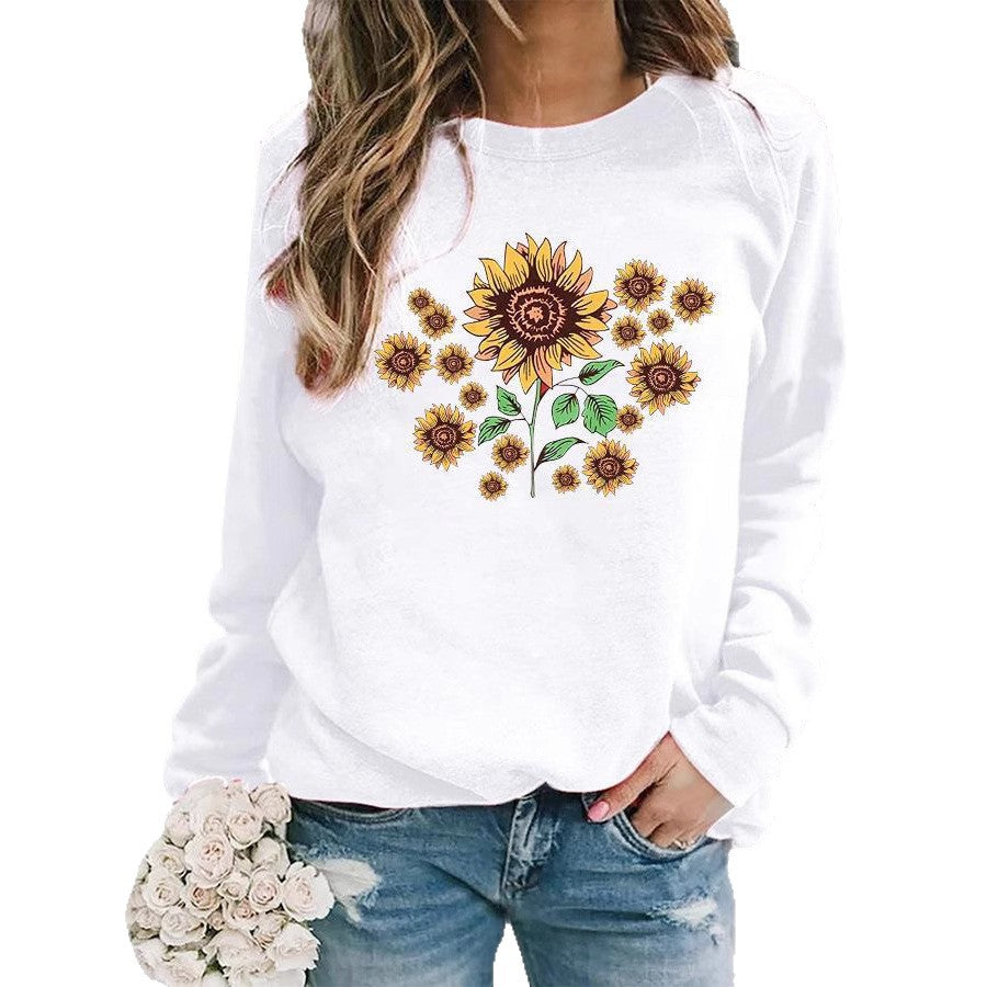 Kvinnohoodie med blommigt solrosmotiv och bekväm passform Mirla-Eva Jonsson