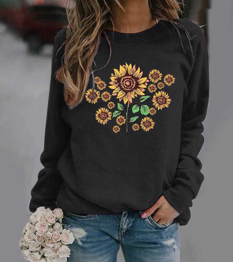 Kvinnohoodie med blommigt solrosmotiv och bekväm passform Mirla-Eva Jonsson