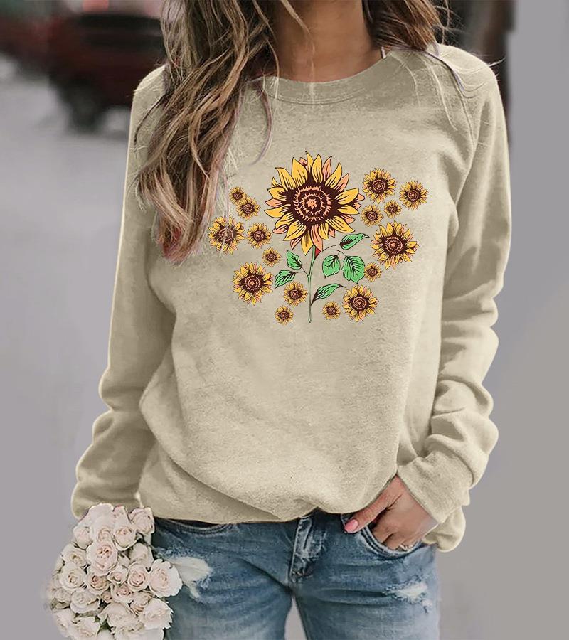 Kvinnohoodie med blommigt solrosmotiv och bekväm passform Mirla-Eva Jonsson