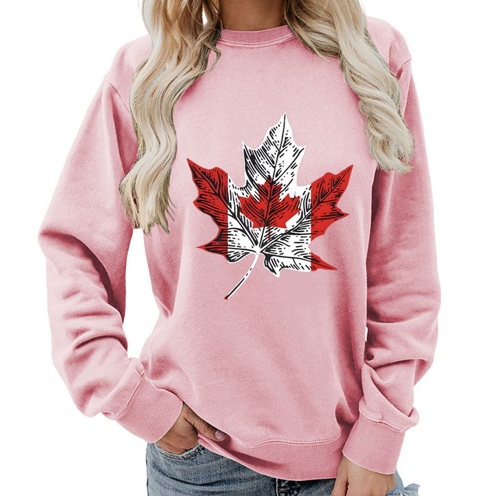 Kvinnohoodie med kreativt lönnlövsmotiv och bekväm passform Mirla-Eva Jonsson