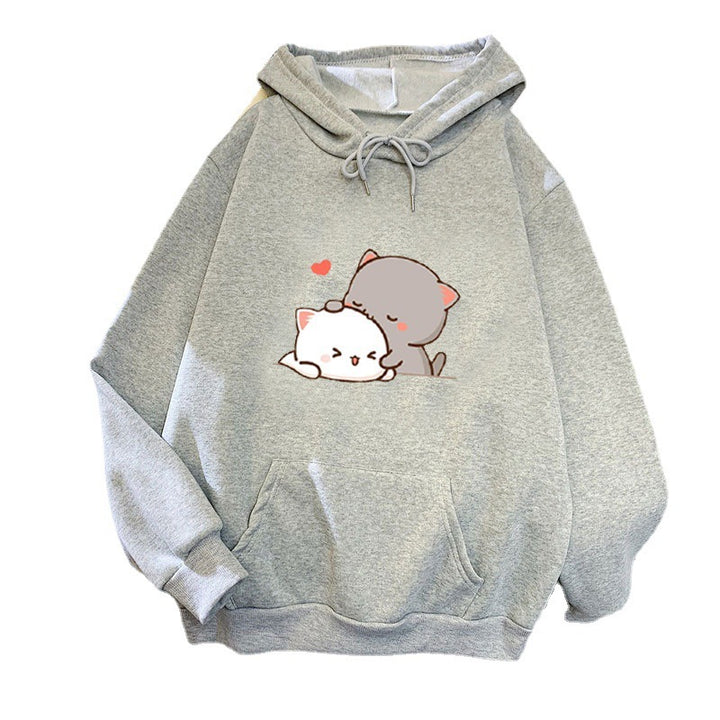 Kvinnohoodie med lekfull kattmotiv och bekväm passform Mirla-Eva Jonsson