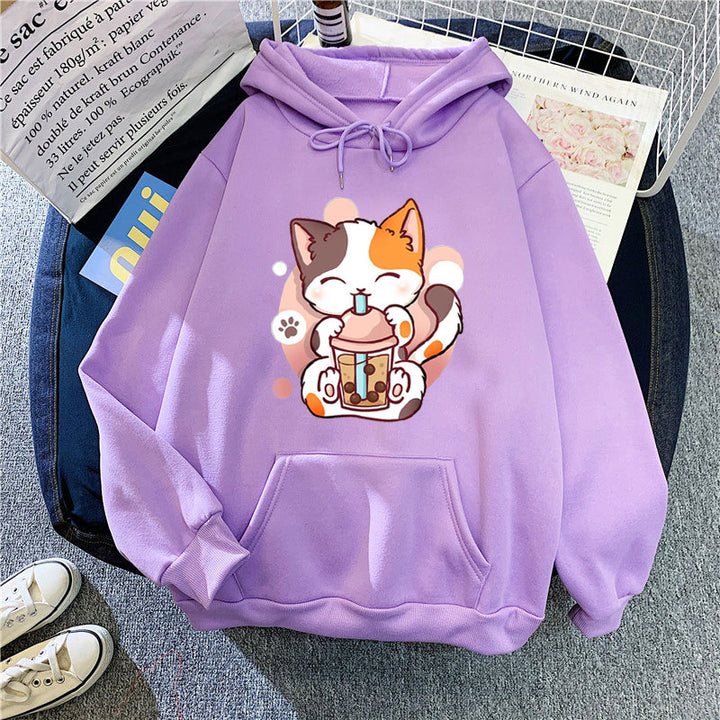 Kvinnohoodie med lekfulla kattmotiv Mirla-Eva Jonsson