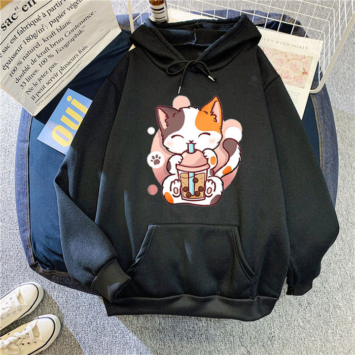 Kvinnohoodie med lekfulla kattmotiv Mirla-Eva Jonsson
