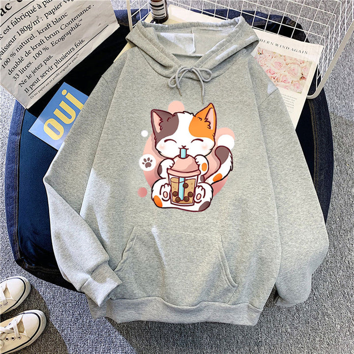 Kvinnohoodie med lekfulla kattmotiv Mirla-Eva Jonsson